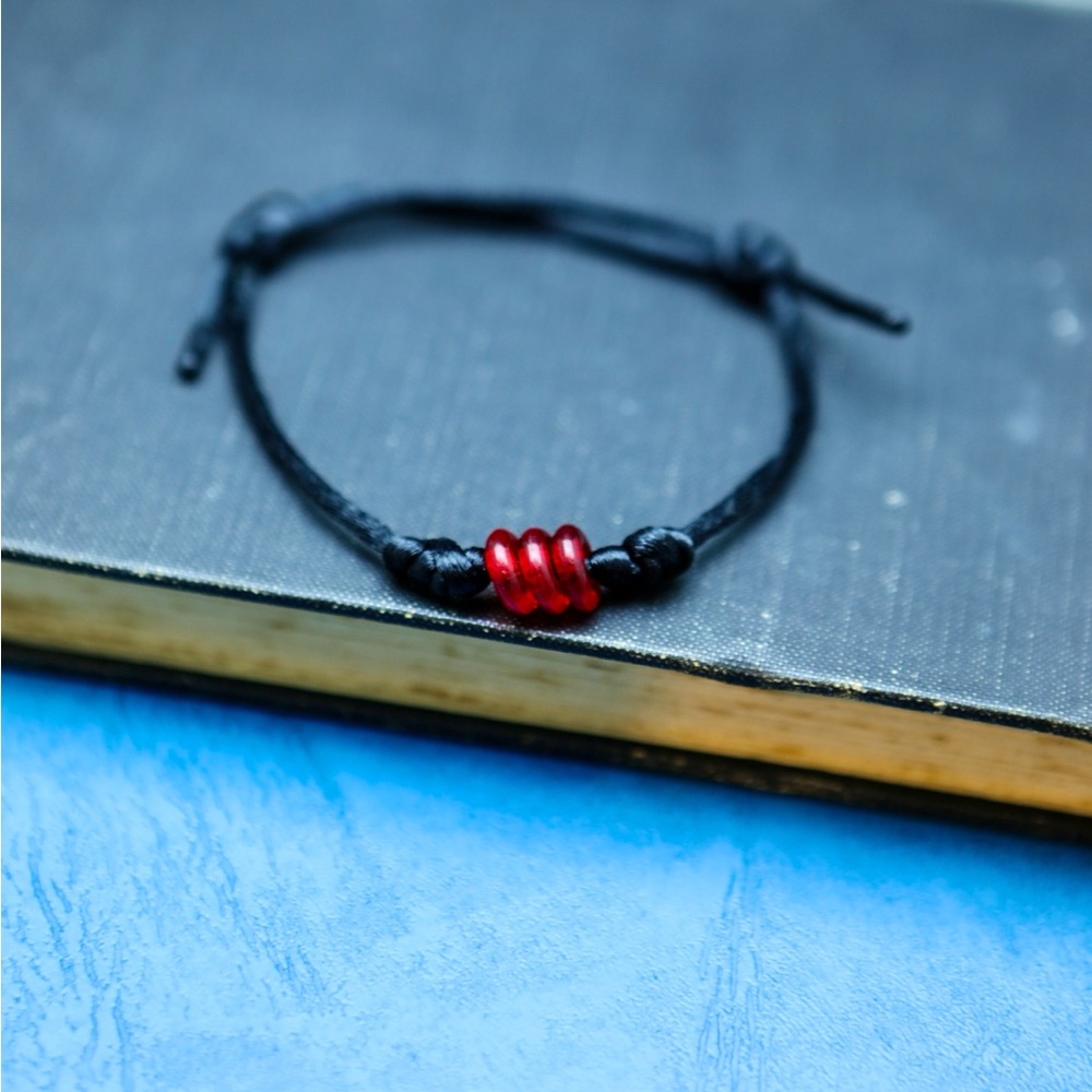 Black Cord Bracelet with Red Glass Ring Beads